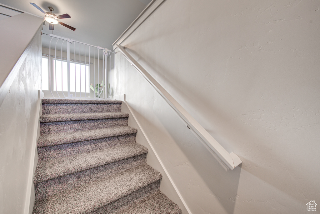 Staircase with ceiling fan