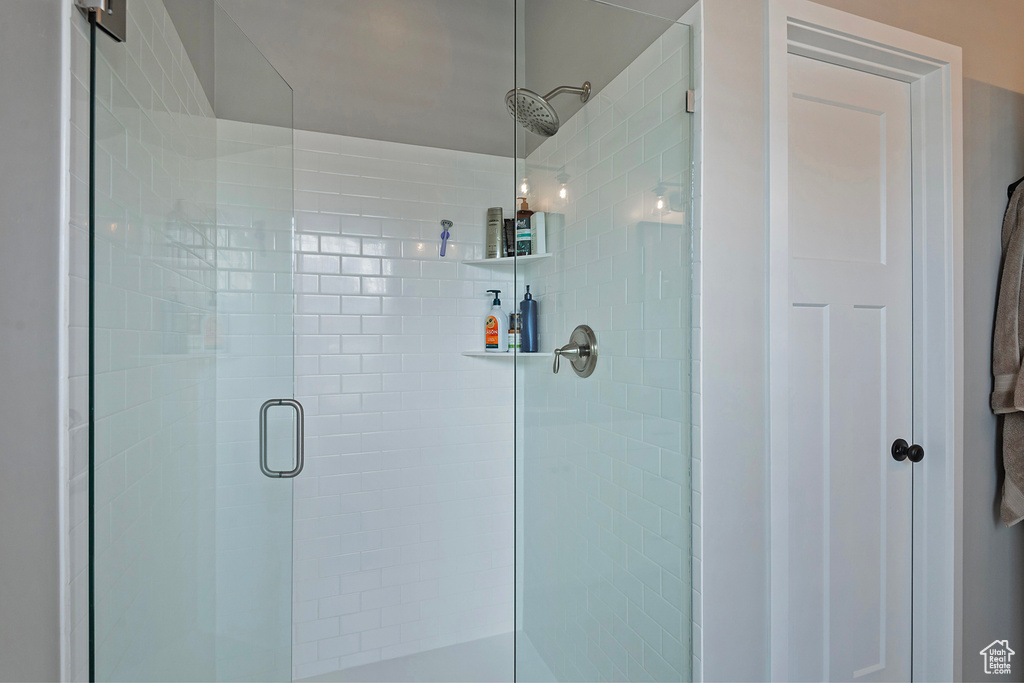 Bathroom featuring an enclosed shower
