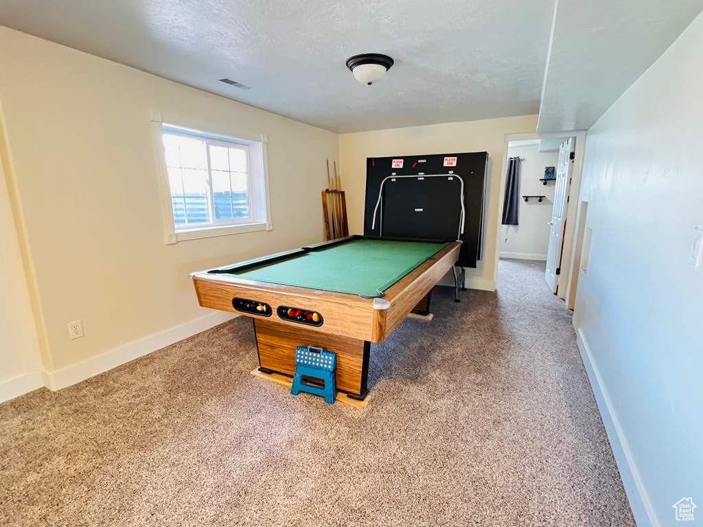 Game room featuring carpet flooring and pool table