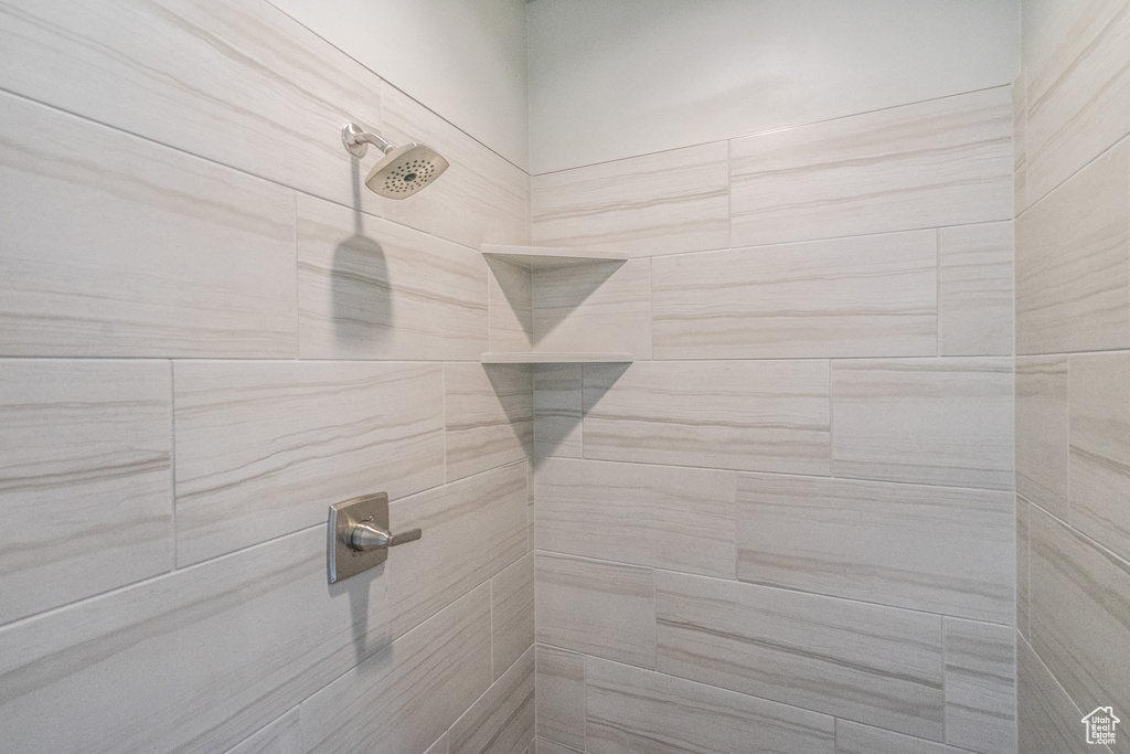 Bathroom with tiled shower