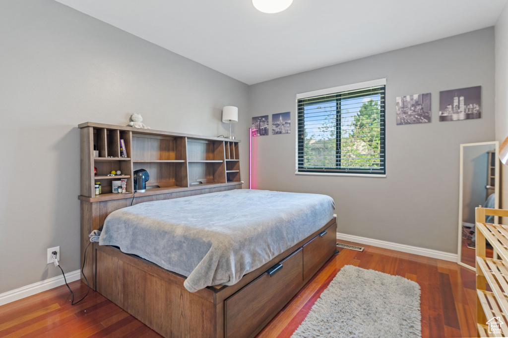 Bedroom featuring hardwood / wood-style floors