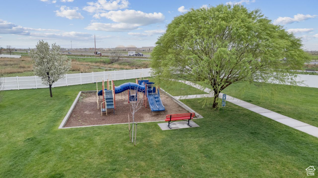 View of play area with a yard