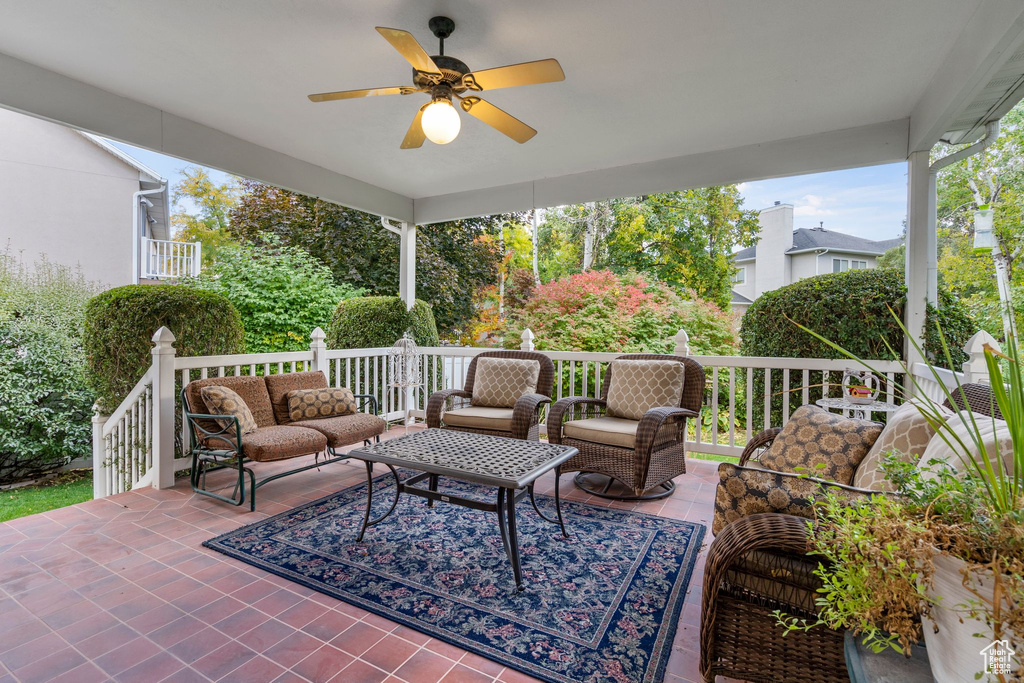 View of patio / terrace with outdoor lounge area and ceiling fan