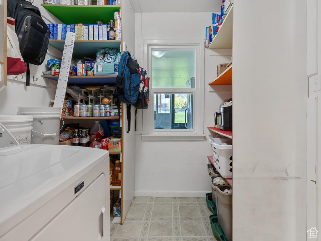 Pantry featuring washer / dryer