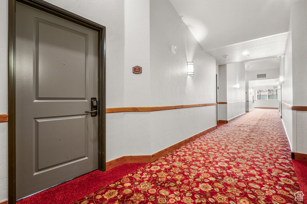 Hall with carpet flooring