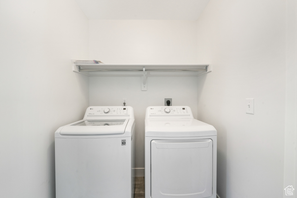 Laundry room with hookup for an electric dryer and washing machine and dryer