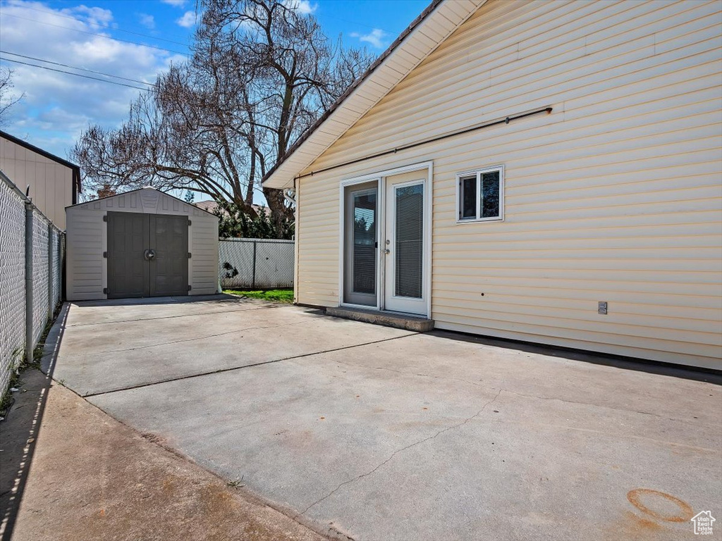 Exterior space featuring a storage shed
