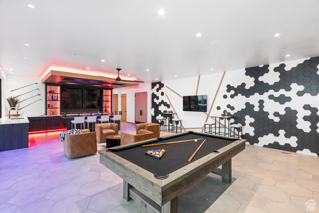 Game room with sink, light tile floors, and billiards
