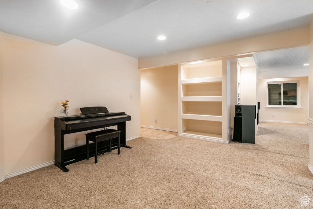 Misc room with light colored carpet