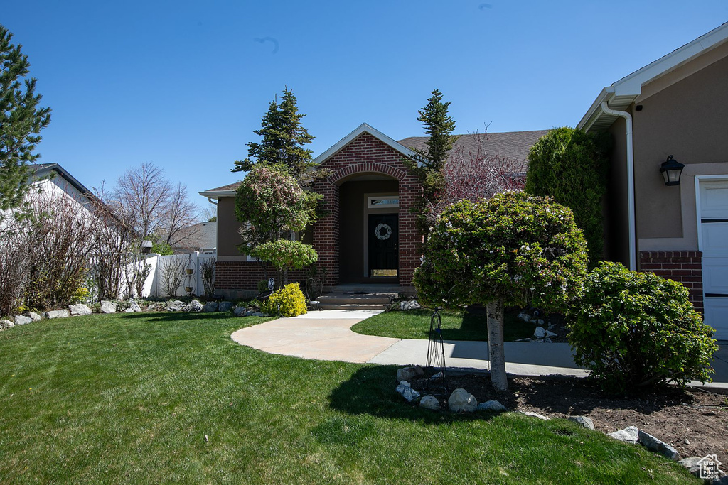 View of front of home with a front lawn