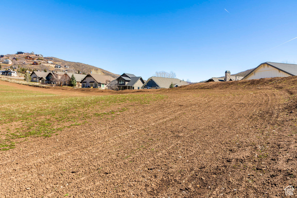 View of yard with a residential view