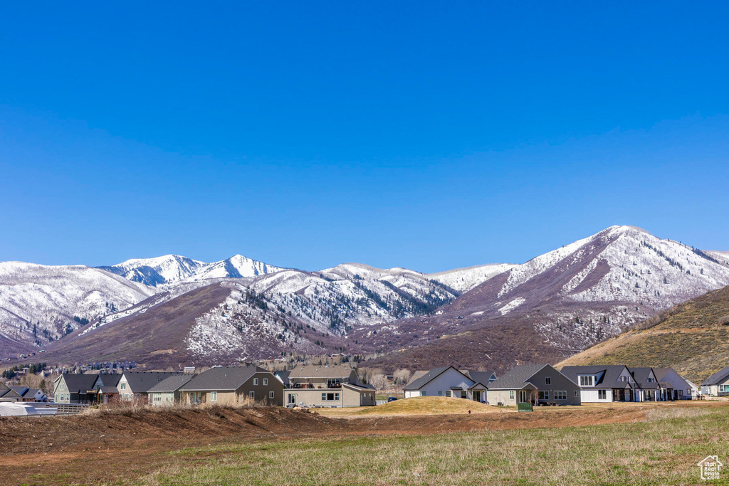 View of mountain backdrop with nearby suburban area