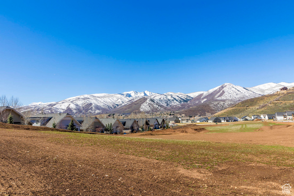 View of mountain backdrop with nearby suburban area