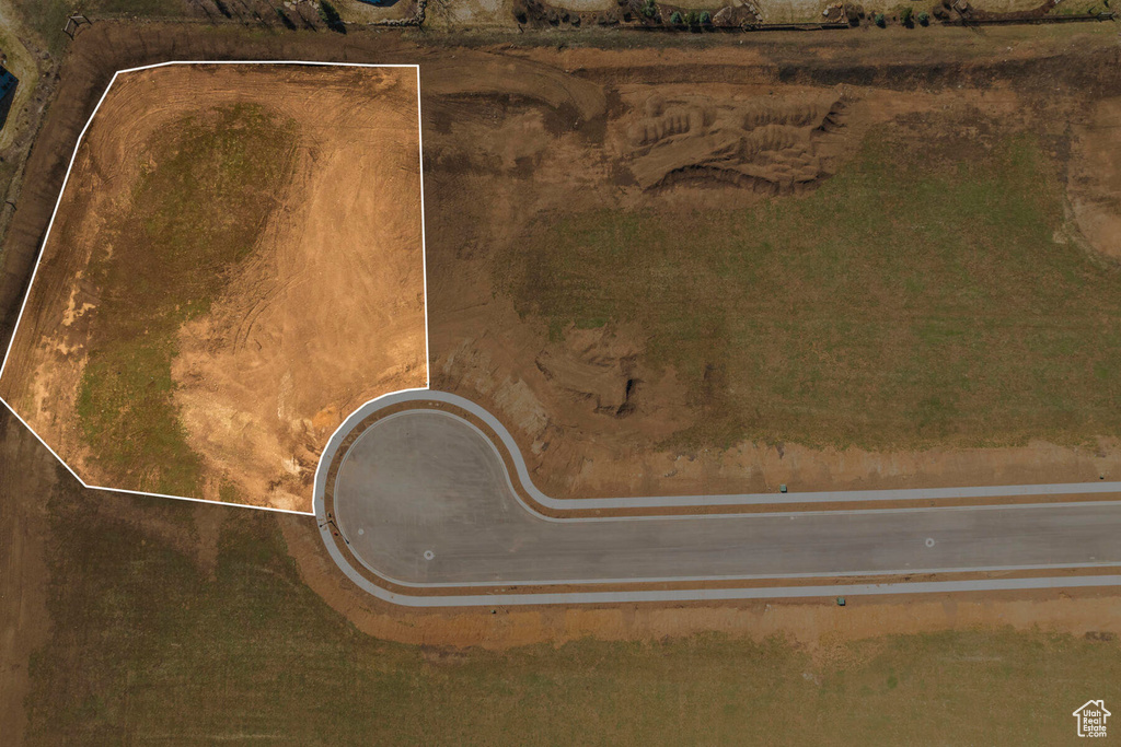 Aerial view of property and surrounding area featuring property boundaries highlighted
