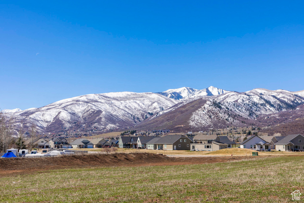 View of mountain backdrop with nearby suburban area