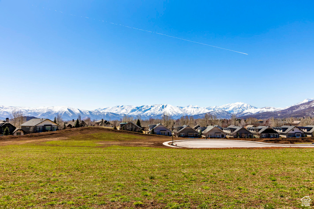 Mountain view featuring nearby suburban area