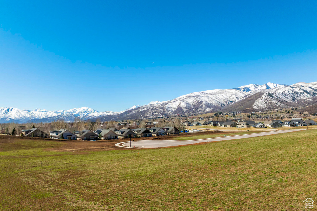 View of mountain backdrop with nearby suburban area