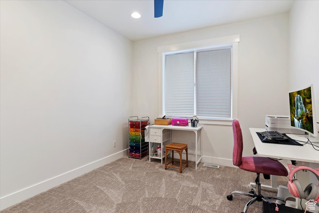 Office space with light colored carpet