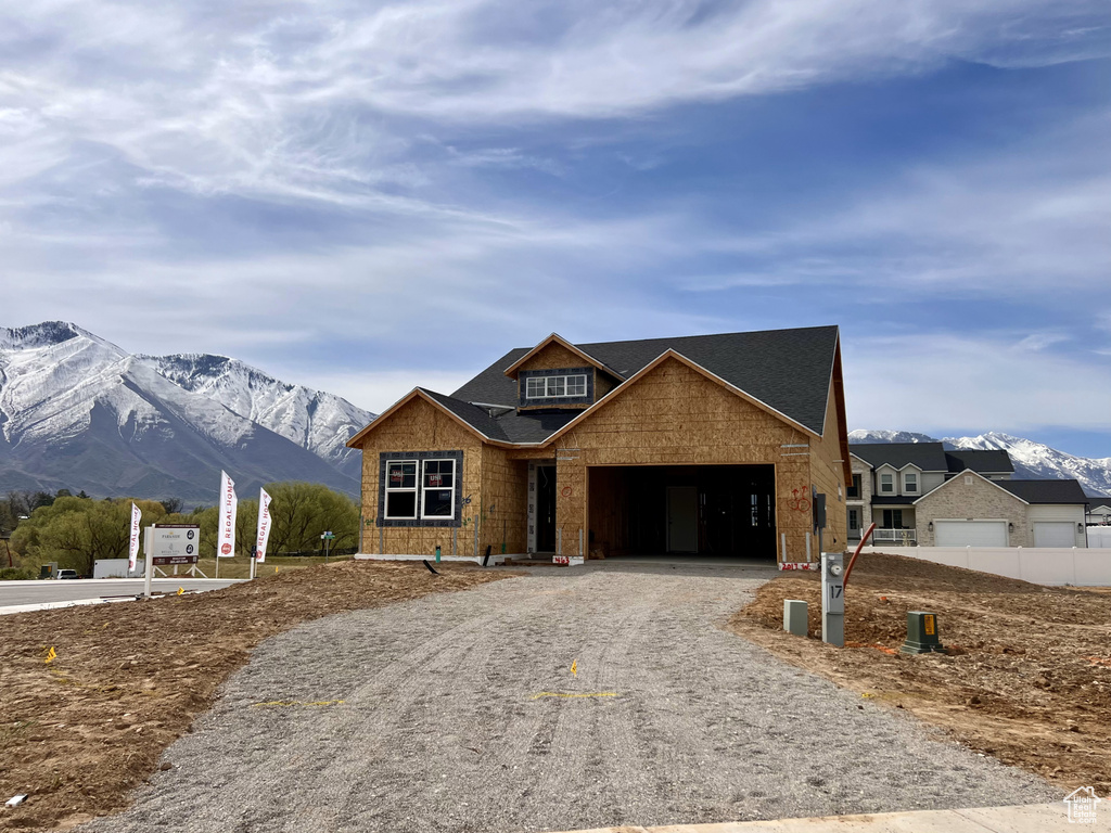 Property under construction featuring a mountain view