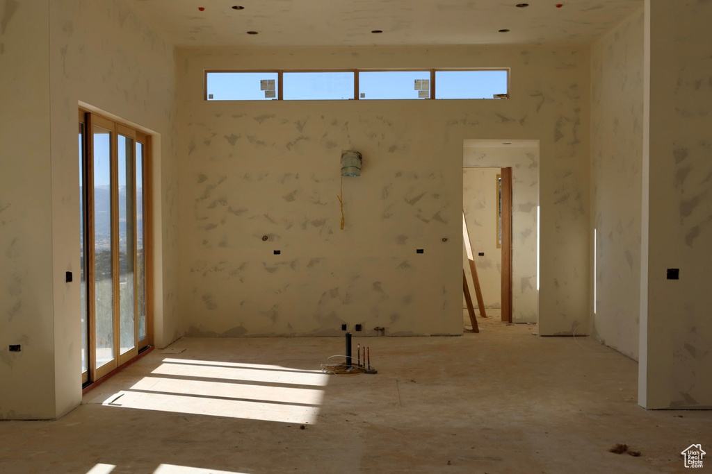 Spare room featuring a wealth of natural light