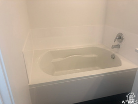 Bathroom featuring a tub