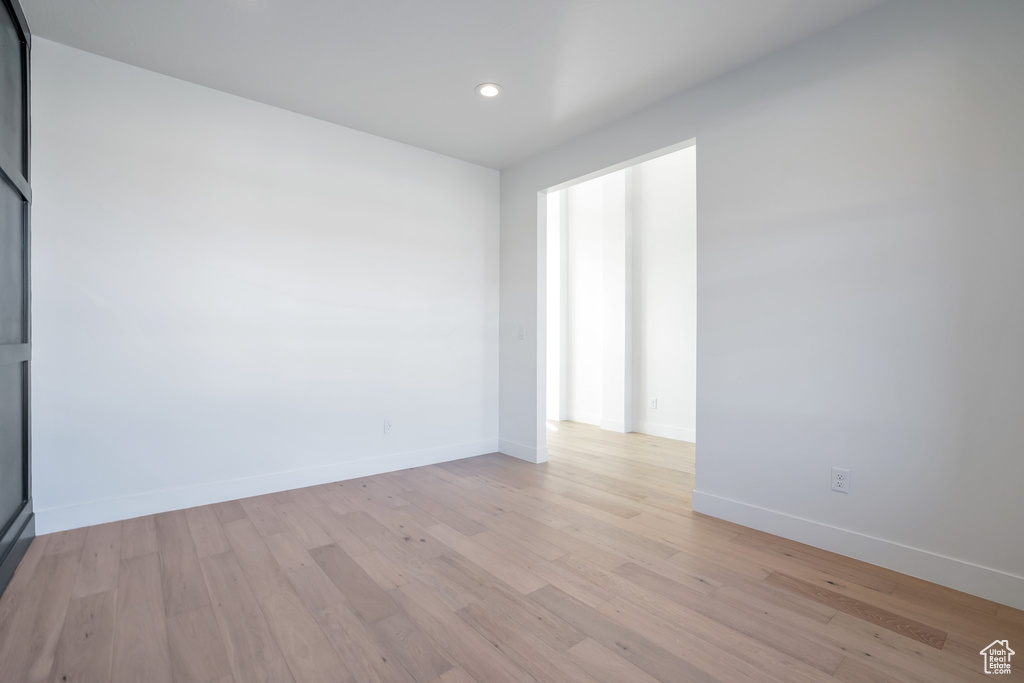 Spare room with light hardwood / wood-style floors