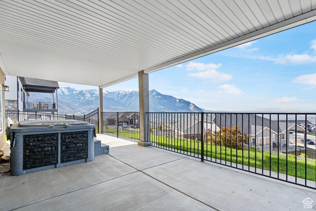 View of terrace featuring a mountain view and a balcony