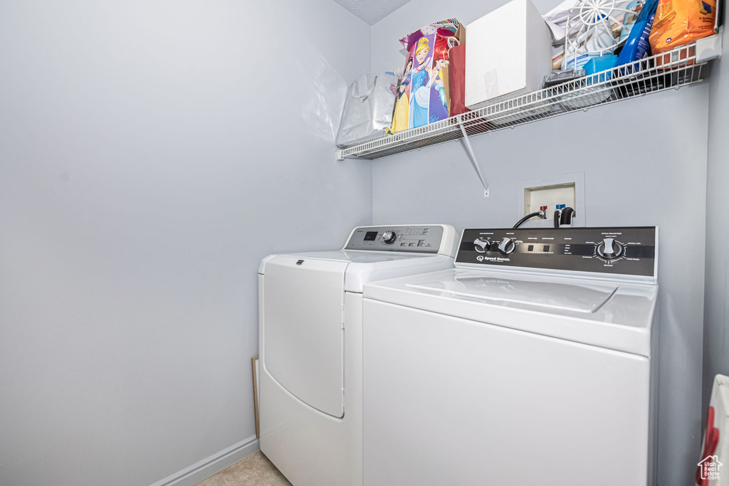 Clothes washing area with washing machine and dryer and hookup for a washing machine