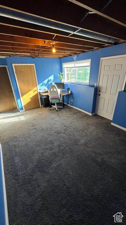 Unfurnished bedroom with carpet flooring