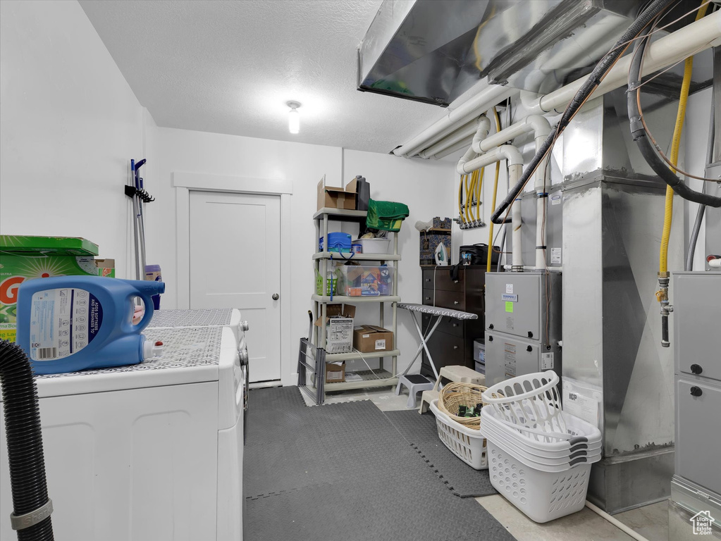 Interior space with washer and clothes dryer
