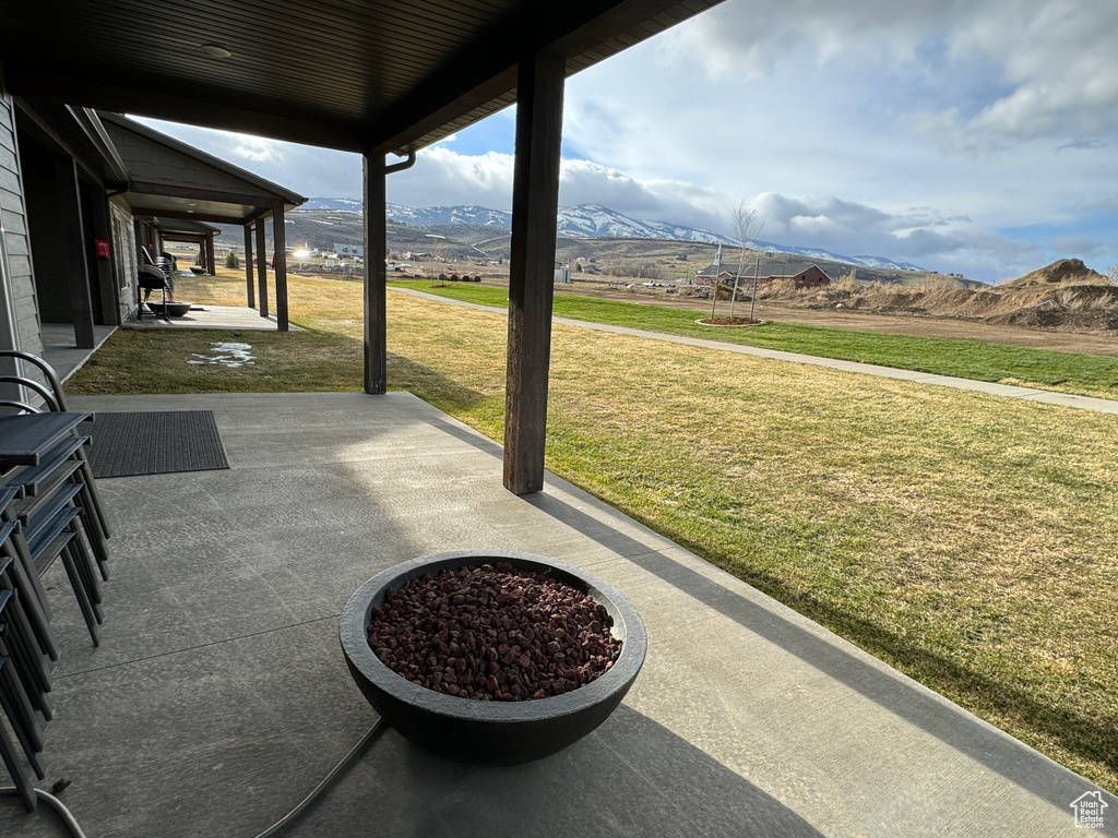 View of terrace featuring a mountain view