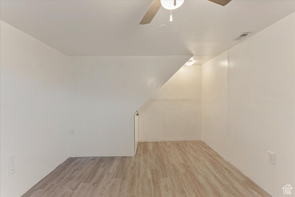 Interior space with light hardwood / wood-style flooring and ceiling fan