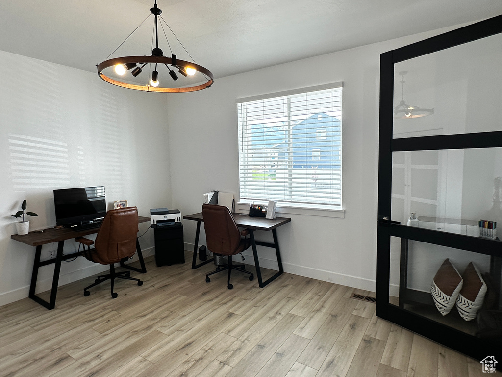 Office featuring light hardwood / wood-style floors