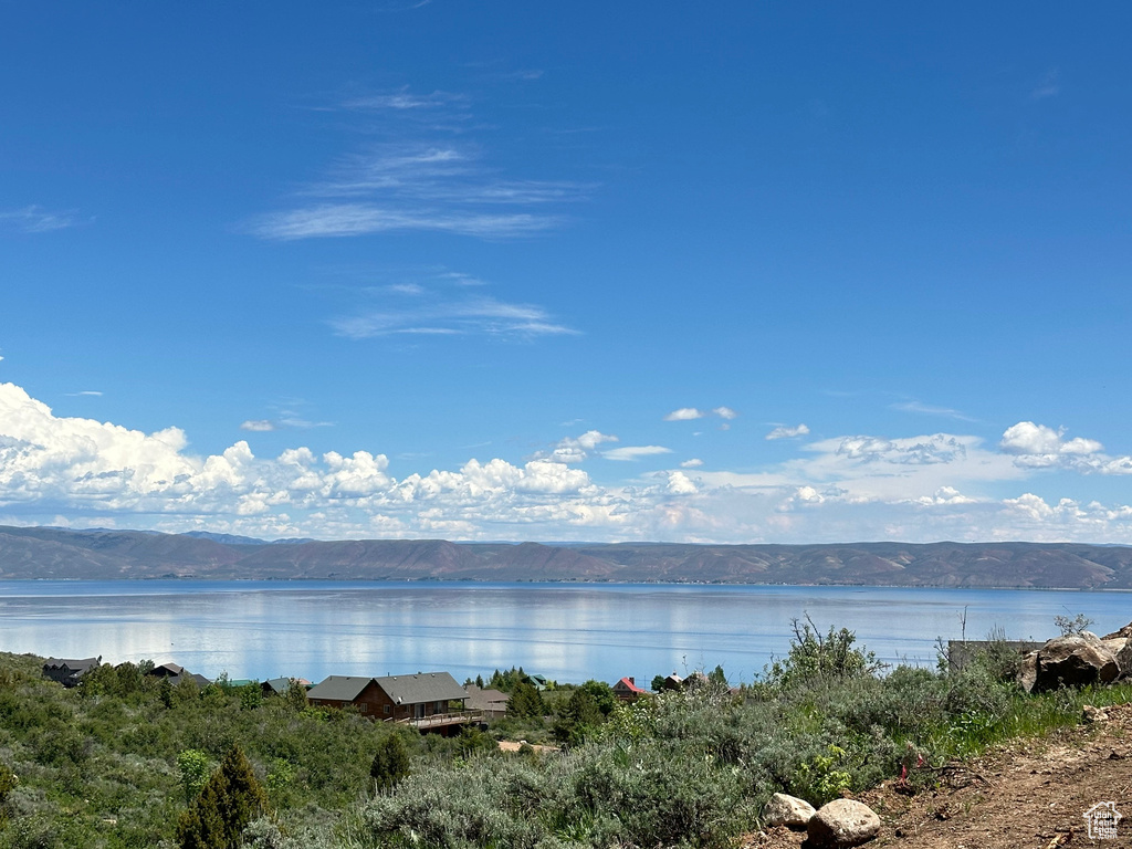 Property view of water with a mountain view