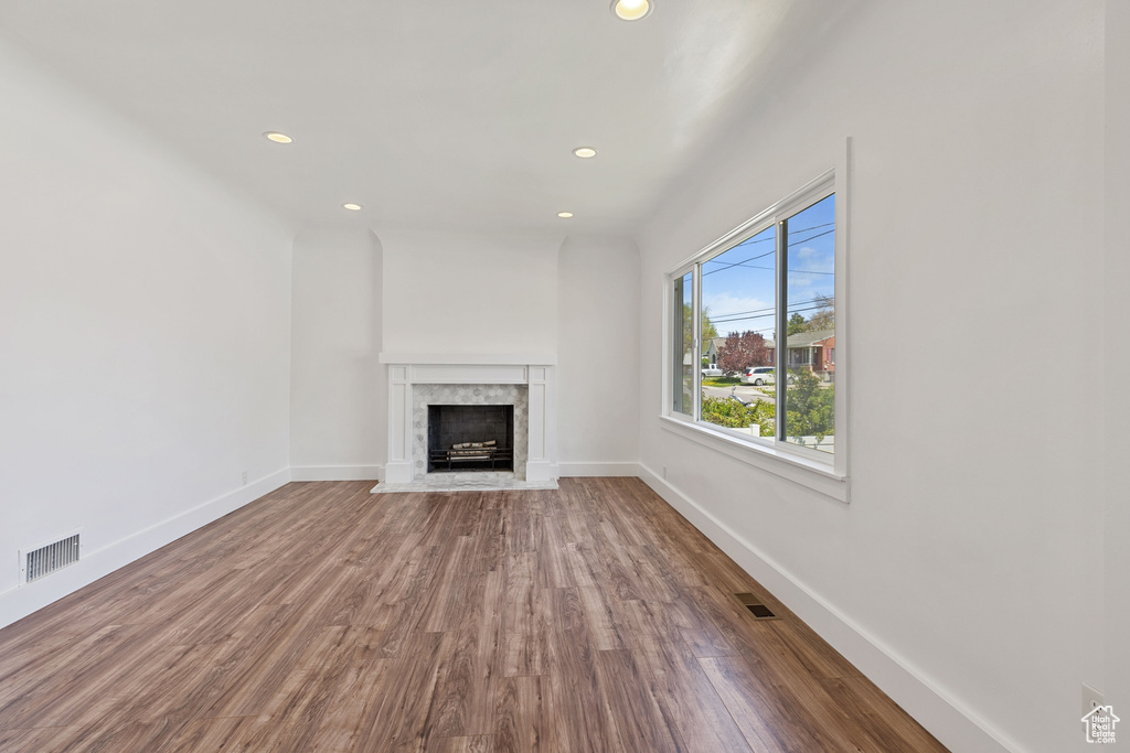 Unfurnished living room with wood-type flooring