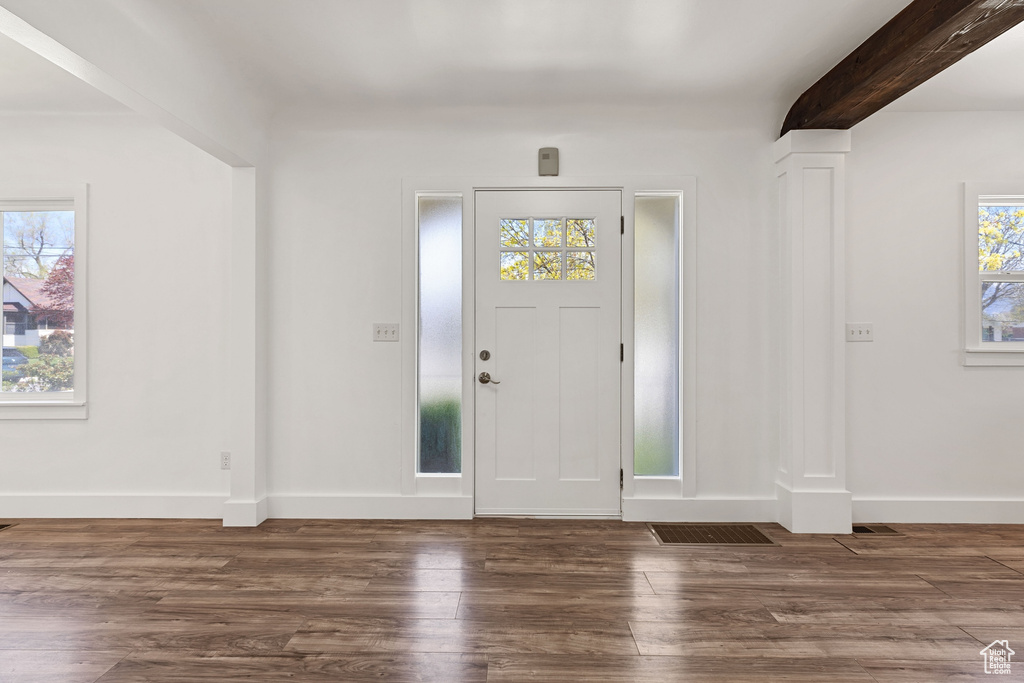 Entrance foyer featuring dark hardwood / wood-style flooring