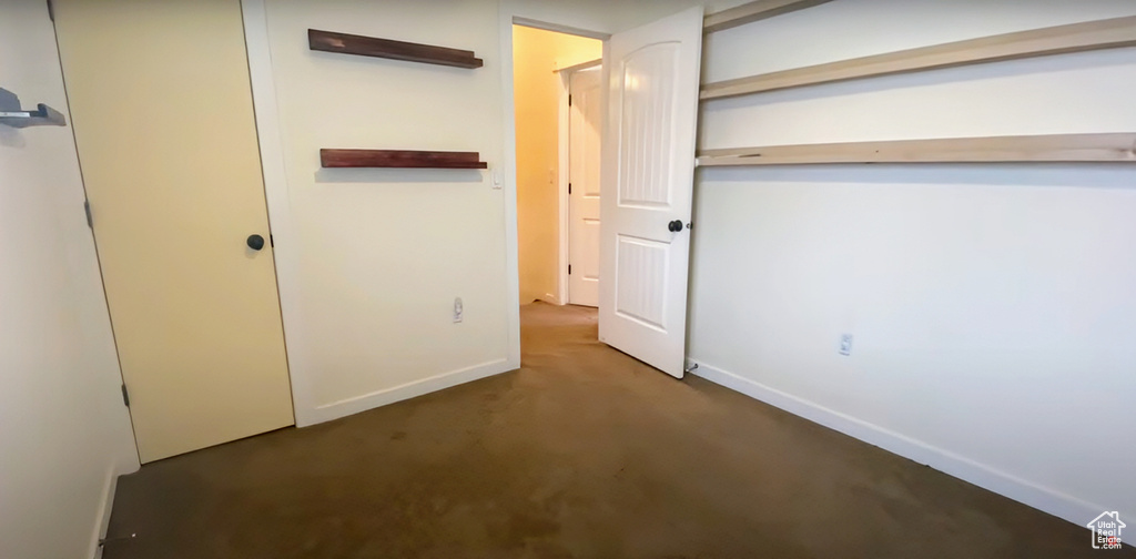 Unfurnished bedroom with a closet