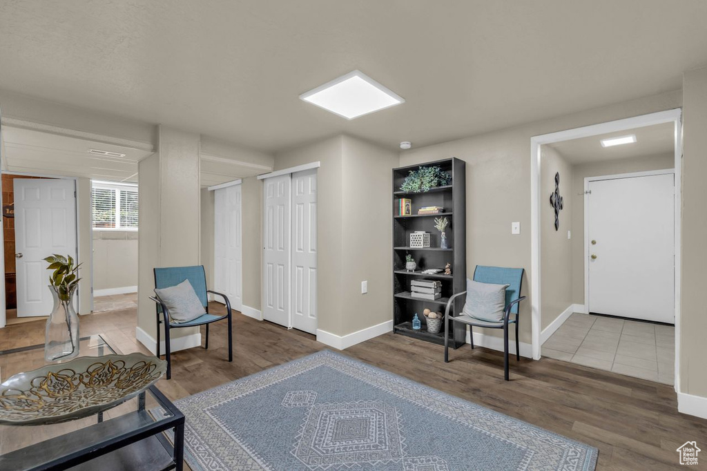 Living area featuring tile flooring