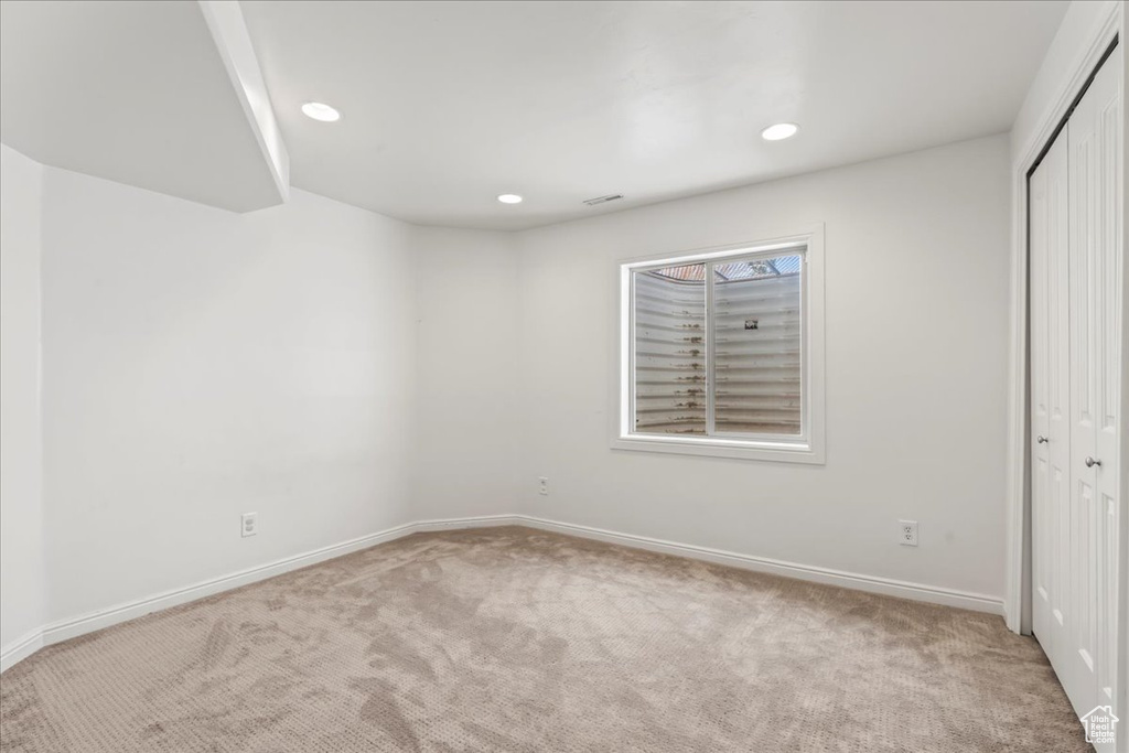 Empty room featuring carpet floors