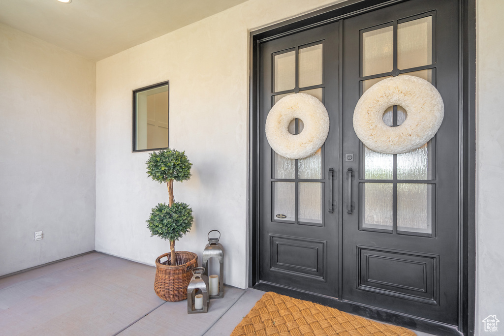 Property entrance with french doors