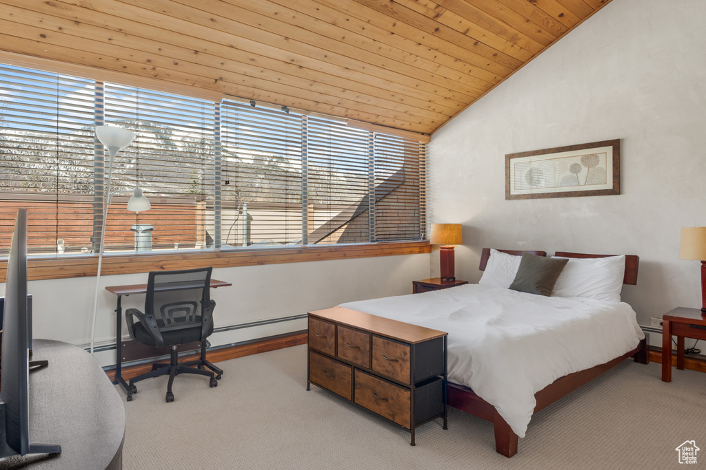 Bedroom with multiple windows, light colored carpet, wooden ceiling, and lofted ceiling