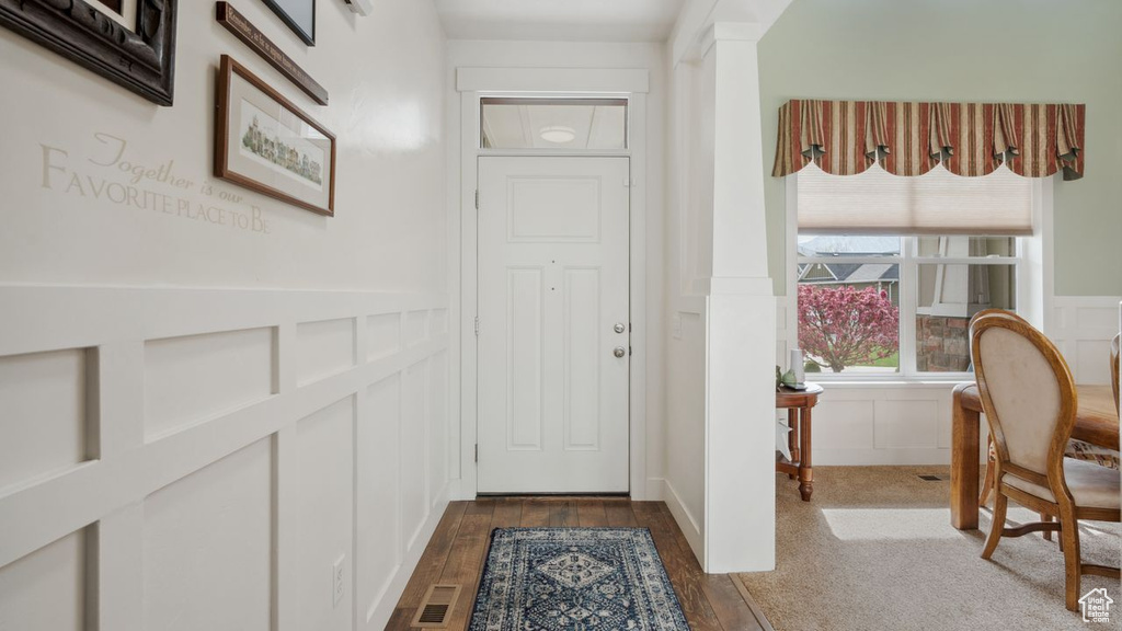 Foyer featuring hardwood / wood-style flooring