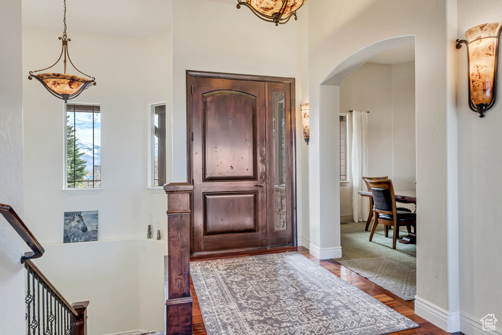 Entrance foyer featuring dark hardwood / wood-style flooring
