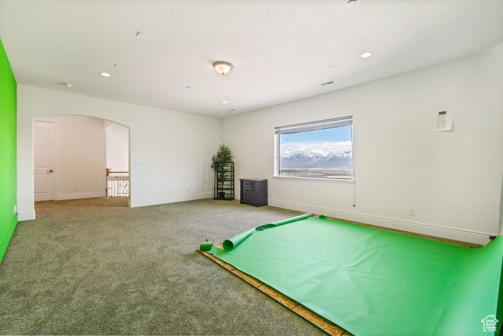 Game room with pool table and carpet