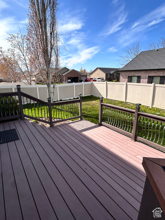 Wooden deck with a lawn