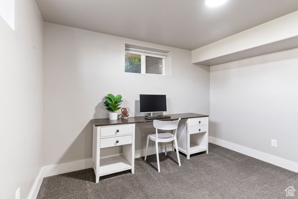 Office space with dark carpet