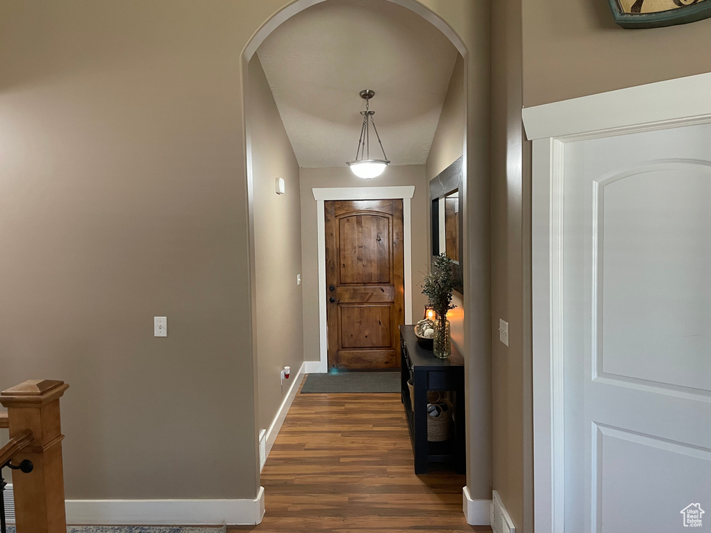 Doorway featuring dark hardwood / wood-style flooring