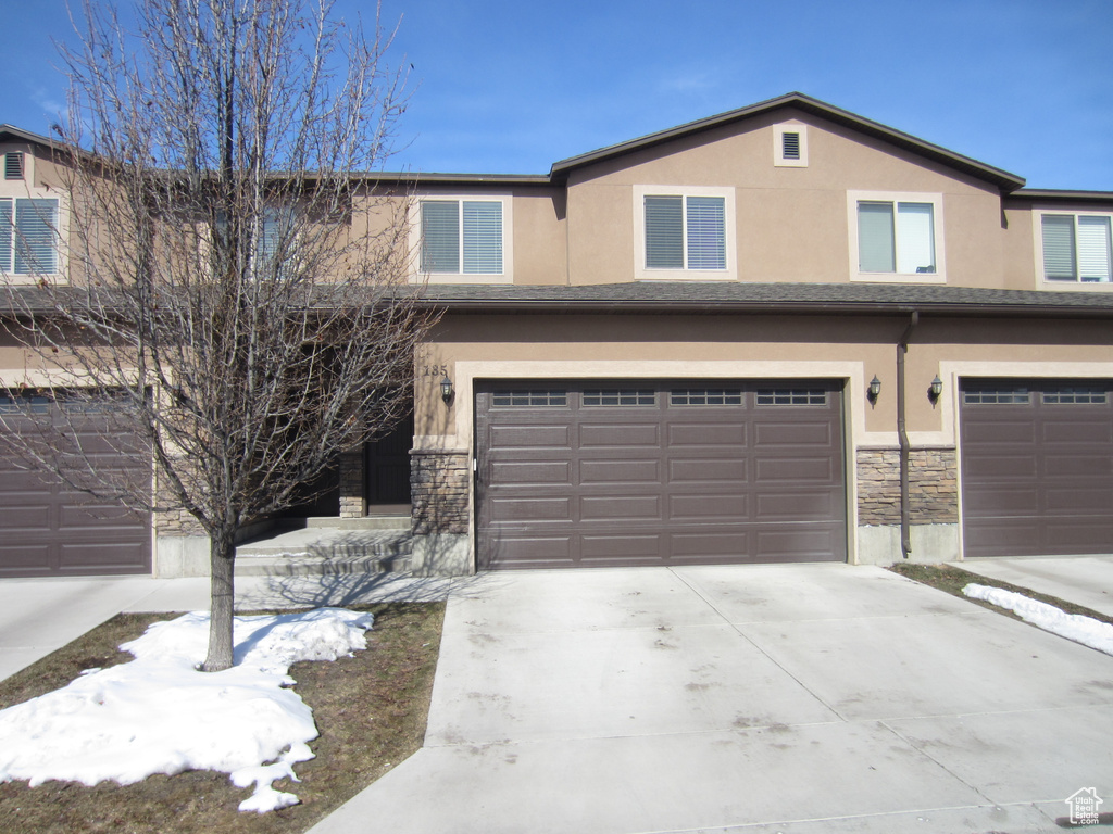 View of front facade with a garage