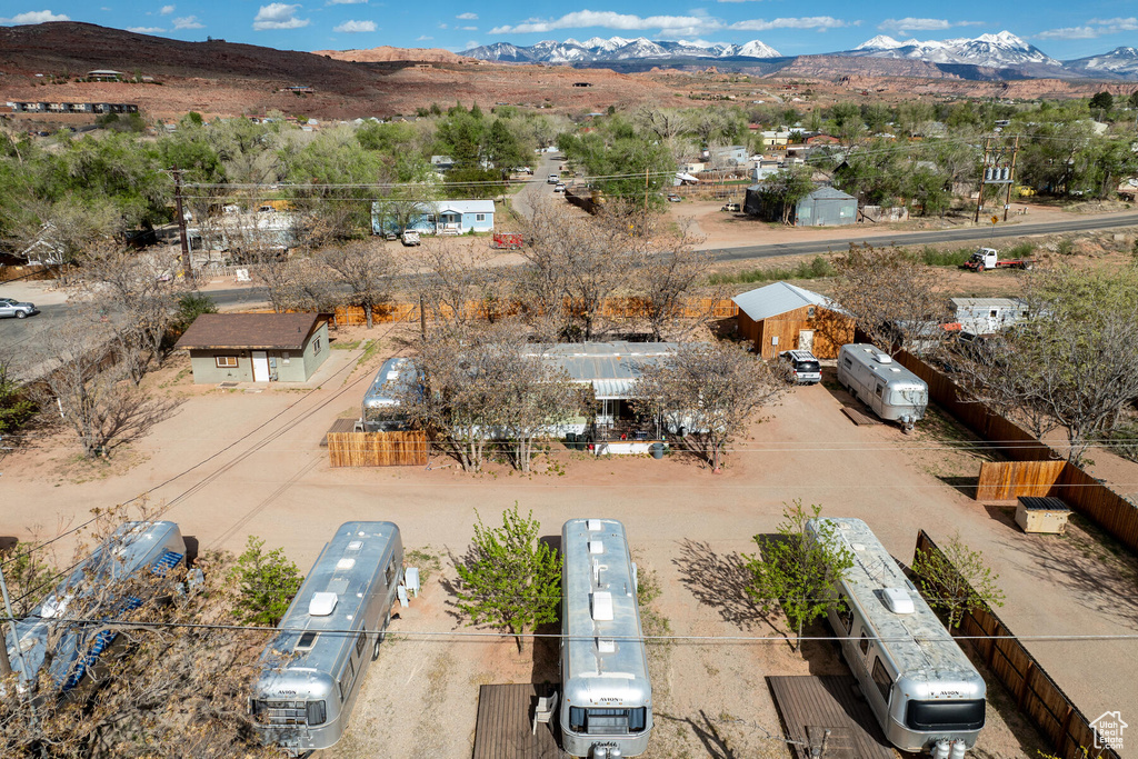 Birds eye view of property with a mountain view