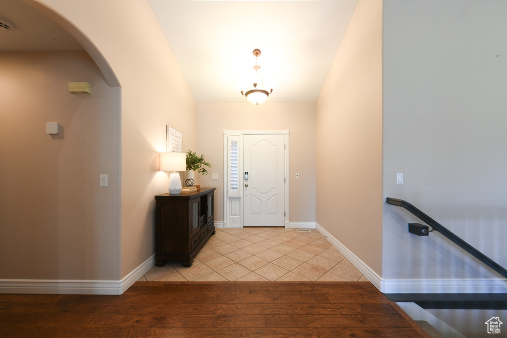 Foyer with hardwood / wood-style flooring